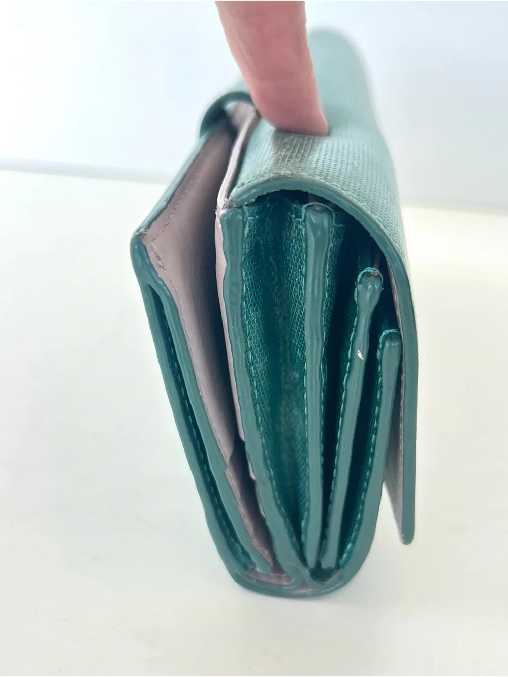 TUMI Sage Shimmer Green Leather Flap Closure Dual Compartment Spacious Wallet